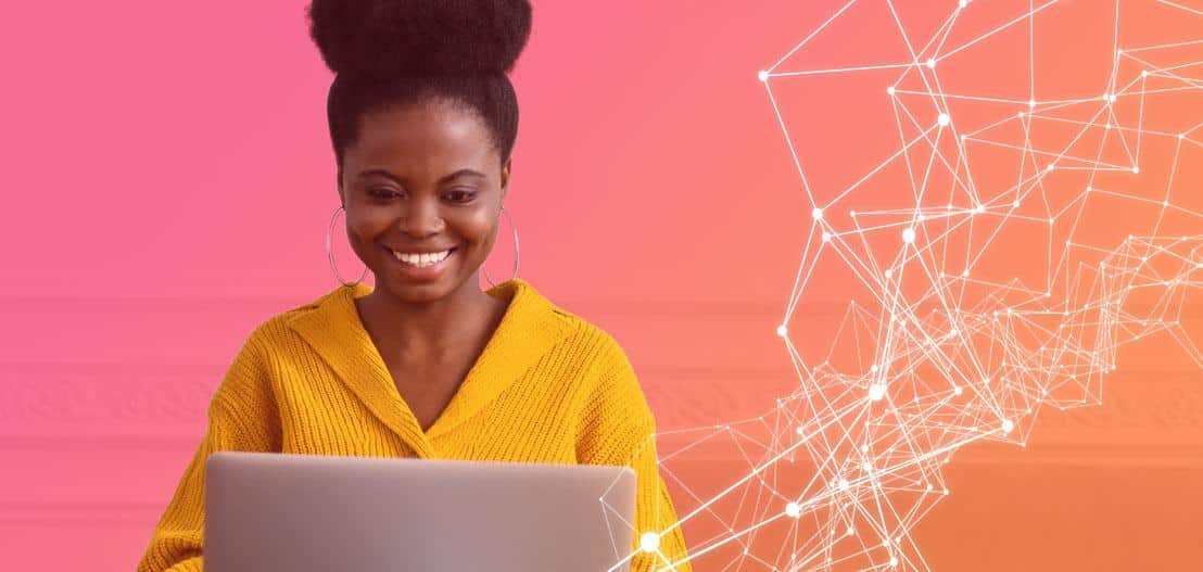 A woman in a yellow sweater smiles at her laptop against a gradient pink-orange background. White, geometric lines and nodes create an intricate pattern to her right, suggesting technology or connectivity.