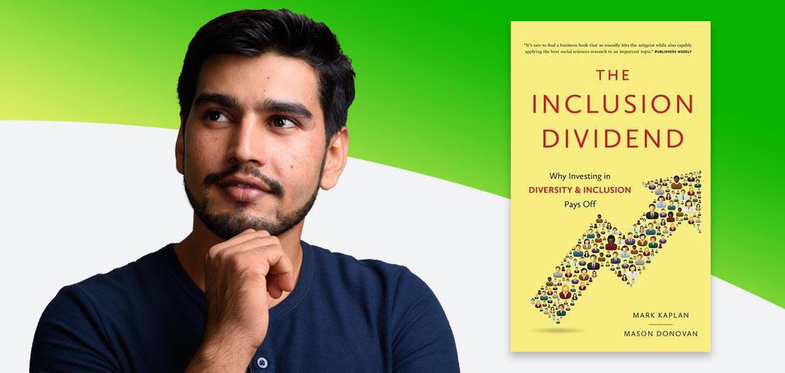 A man with a thoughtful expression stands beside a yellow book titled "The Inclusion Dividend: Why Investing in Diversity & Inclusion Pays Off" by Mark Kaplan and Mason Donovan. The book cover features an arrow made of diverse icons.