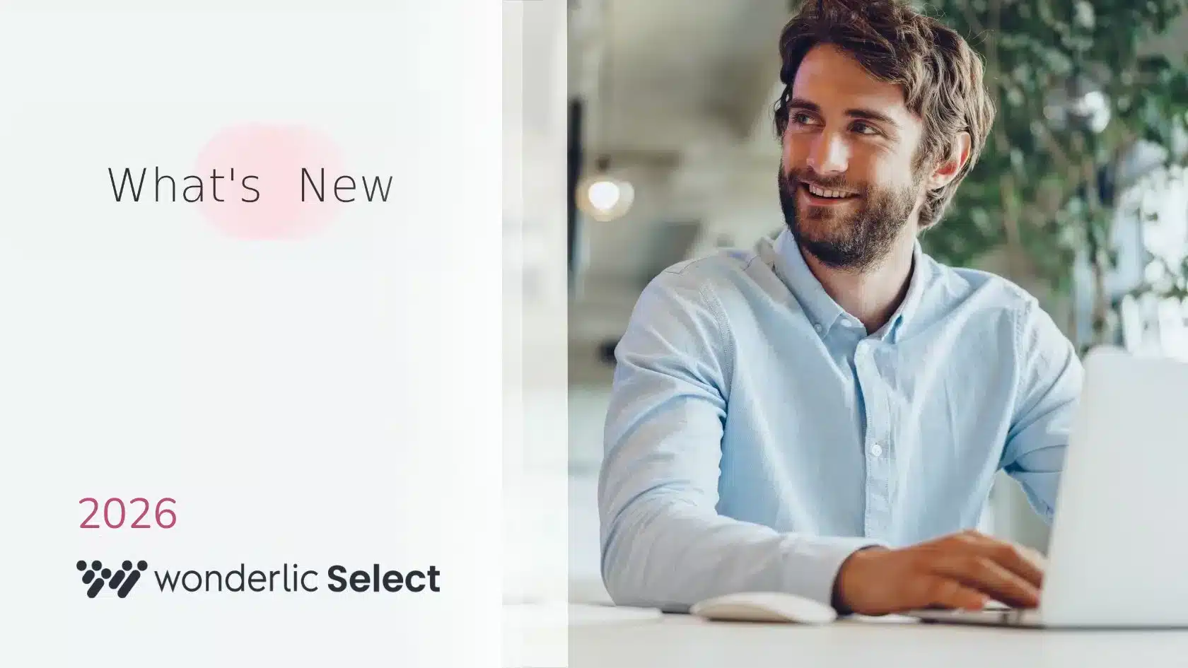 A bearded man in a light blue shirt sits smiling at a desk with a laptop. On the left, text reads "What's New," "2026," and "wonderlic Select." The bright, modern background hints at a wonderlic product update June release.