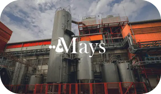 The Mays Chemical logo over a photo of one of their processing plants