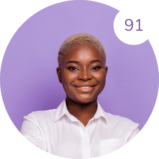 A person with short, light-colored hair is smiling and wearing a white shirt. The background is purple, and there is a white circle in the upper right corner of the image with the number 91 inside it, symbolizing a recent hiring assessment result.